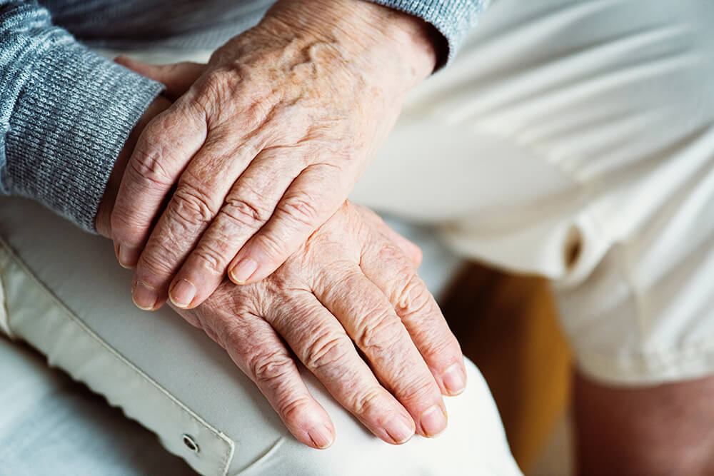 A close up of a senior citizen's hands