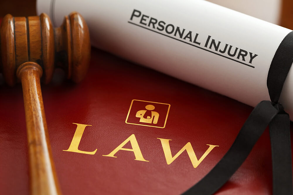 Gavel on top of file that says Personal Injury Law